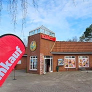 Supermarkt: Nahkauf Gebäude mit Nahkauf Logo